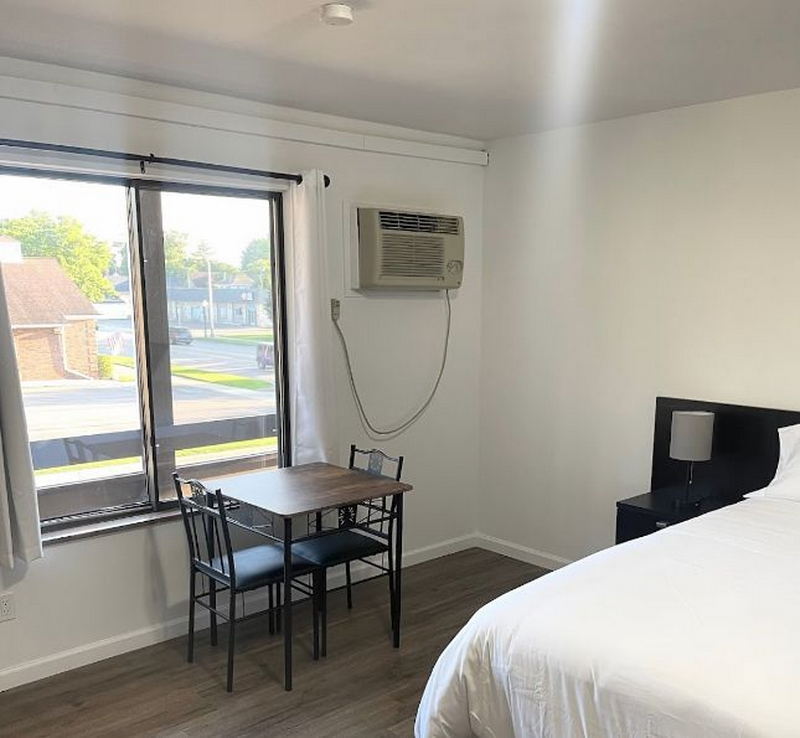 Downtown Inn (Spartan Motel, Spartan Inn) - Vintage Postcard (newer photo)